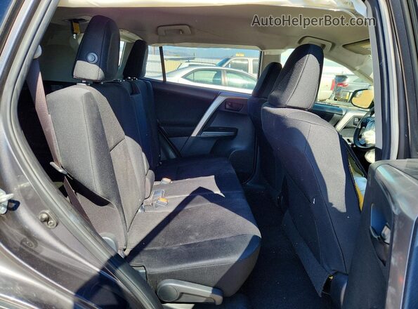 JTMBFREV1HJ124803 2017 TOYOTA RAV4 Gray Rear interior view