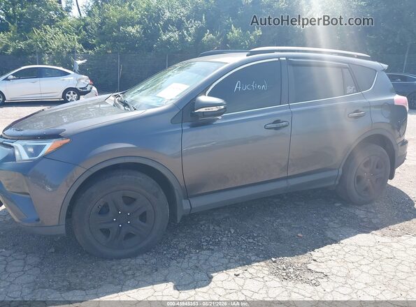 JTMBFREV1JJ250522 2018 TOYOTA RAV4 Gray Vista tres cuartos delantera izquierda
