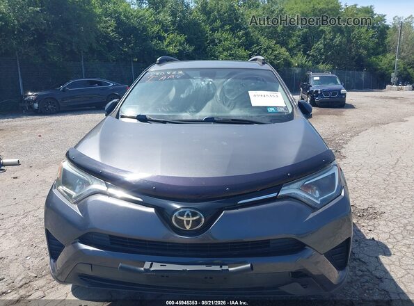 JTMBFREV1JJ250522 2018 TOYOTA RAV4 Gray Vista del salpicadero