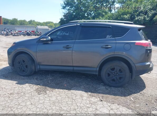 JTMBFREV1JJ250522 2018 TOYOTA RAV4 Gray Vista interior trasera