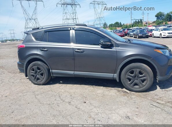 JTMBFREV1JJ250522 2018 TOYOTA RAV4 Gray Vista del cuadro de instrumentos