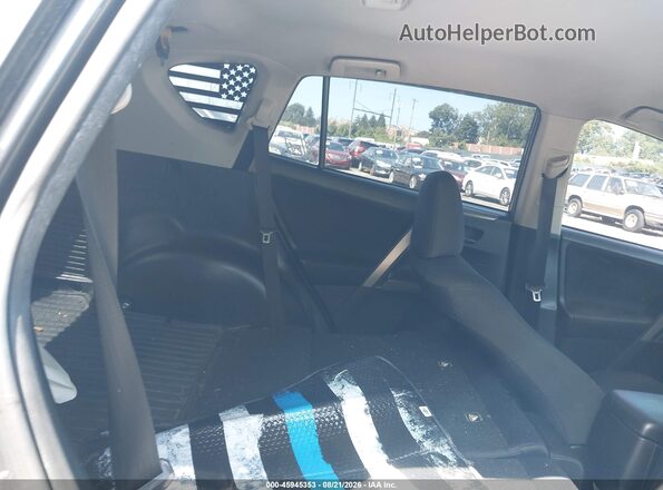 JTMBFREV1JJ250522 2018 TOYOTA RAV4 Gray Vista de los asientos traseros