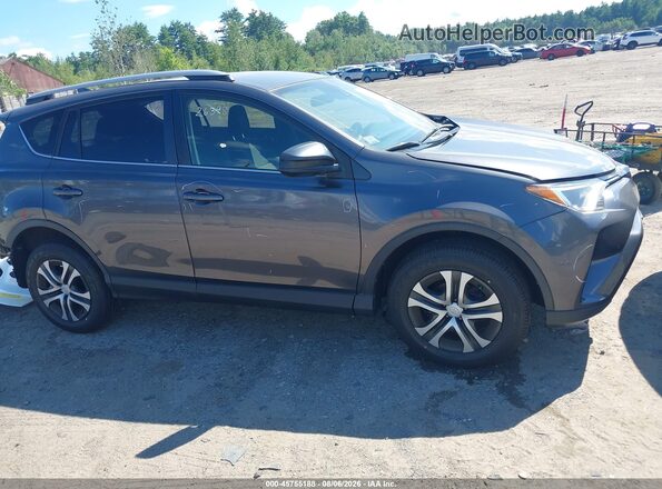 JTMBFREV1JJ260399 2018 TOYOTA RAV4 Gray Widok wnętrza z tyłu
