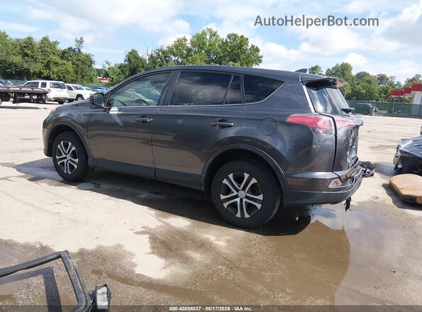 JTMBFREV1JJ746372 2018 TOYOTA RAV4 Gray Trasero izquierdo