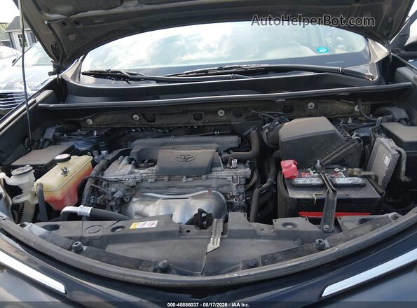 JTMBFREV1JJ746372 2018 TOYOTA RAV4 Gray Vista trasera