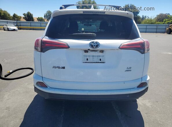 JTMBFREV2GJ100444 2016 TOYOTA RAV4 White Rear view