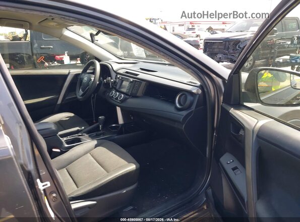 JTMBFREV2JJ222440 2018 TOYOTA RAV4 Gray Front interior view
