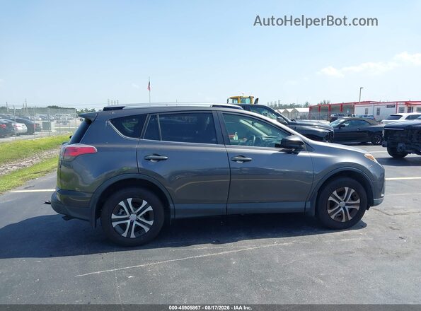 JTMBFREV2JJ222440 2018 TOYOTA RAV4 Gray Rear interior view