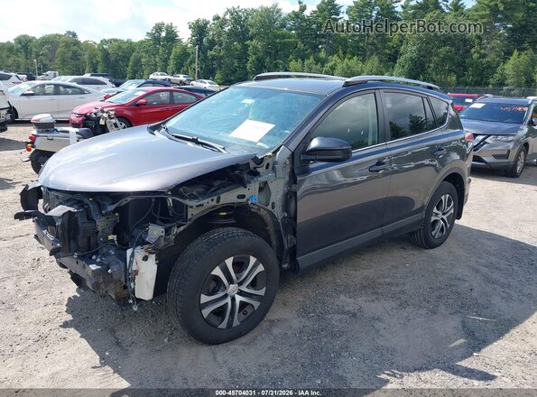 JTMBFREV3GJ074971 2016 TOYOTA RAV4 Gray Vista tres cuartos delantera izquierda