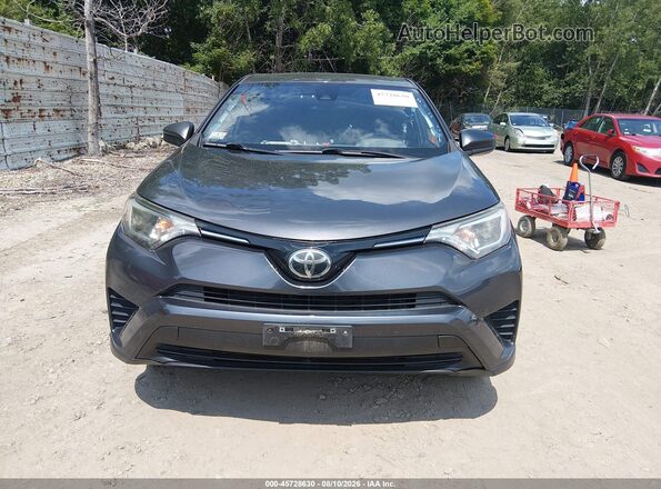 JTMBFREV3HJ710497 2017 TOYOTA RAV4 Gray Vista interior trasera