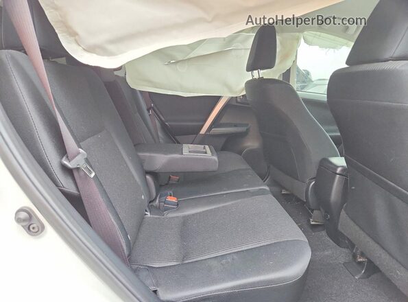 JTMBFREV3JJ244334 2018 TOYOTA RAV4 White Vista interior trasera