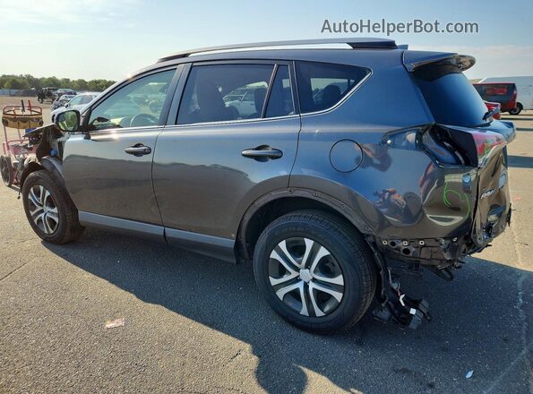 JTMBFREV3JJ246939 2018 TOYOTA RAV4 Gray Trasero izquierdo