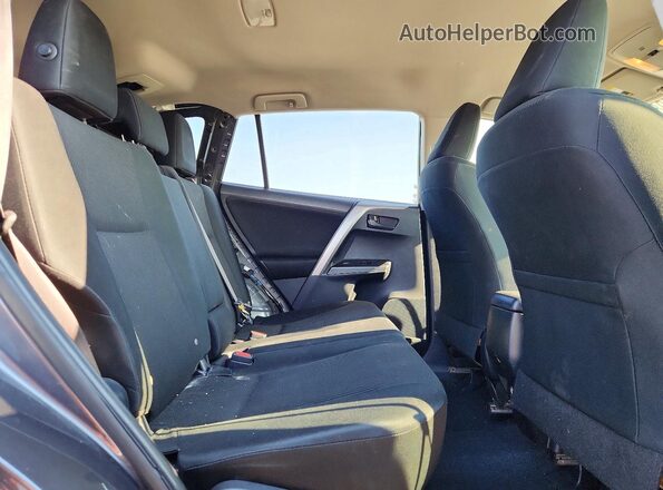 JTMBFREV3JJ246939 2018 TOYOTA RAV4 Gray Vista interior trasera