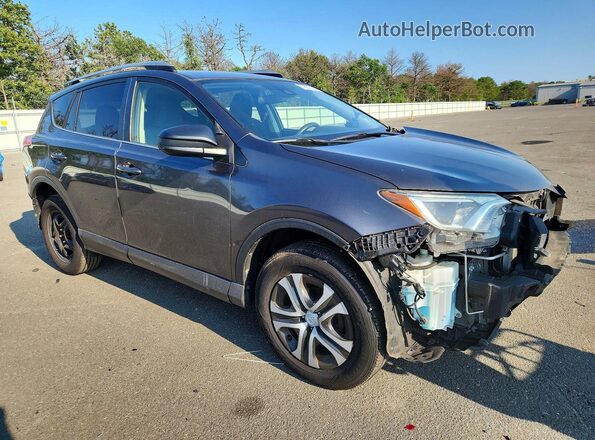 JTMBFREV3JJ246939 2018 TOYOTA RAV4 Gray Delantero derecho