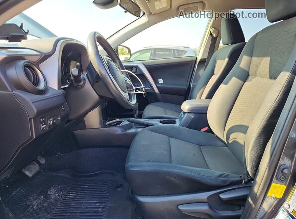 JTMBFREV3JJ246939 2018 TOYOTA RAV4 Gray Vista interior delantera