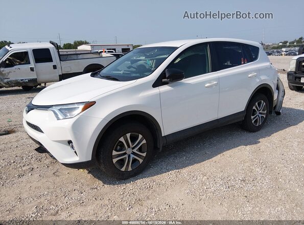 JTMBFREV4GJ059671 2016 TOYOTA RAV4 White Front left