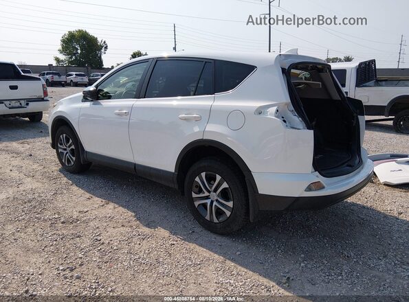 JTMBFREV4GJ059671 2016 TOYOTA RAV4 White Rear left