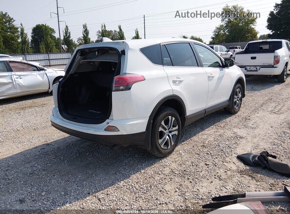 JTMBFREV4GJ059671 2016 TOYOTA RAV4 White Rear right
