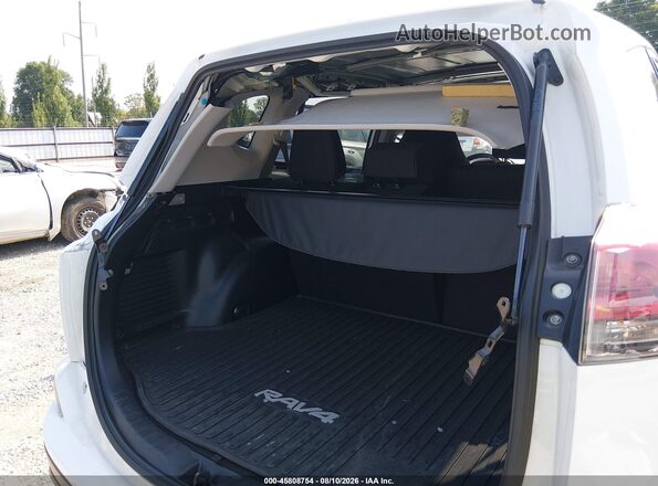 JTMBFREV4GJ059671 2016 TOYOTA RAV4 White Front view