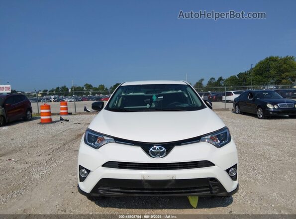 JTMBFREV4GJ059671 2016 TOYOTA RAV4 White Rear interior view