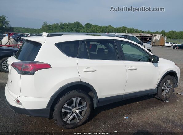 JTMBFREV4GJ101806 2016 TOYOTA RAV4 White Vista interior trasera