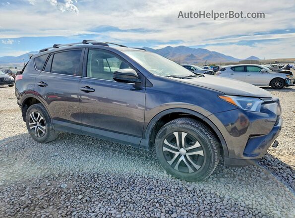 JTMBFREV4HJ707852 2017 TOYOTA RAV4 Gray Front right