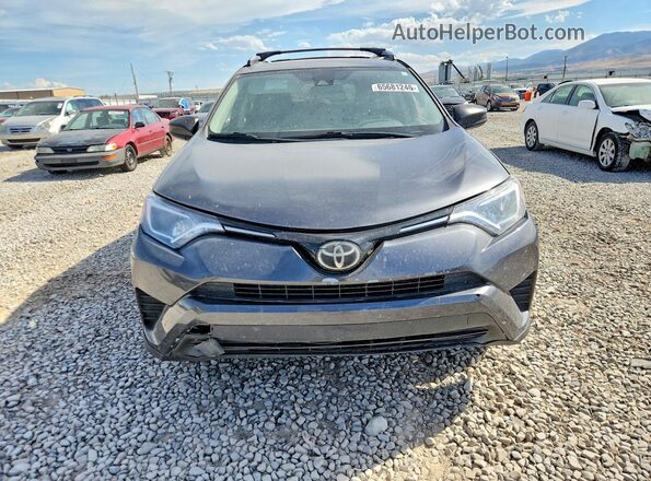 JTMBFREV4HJ707852 2017 TOYOTA RAV4 Gray Front view