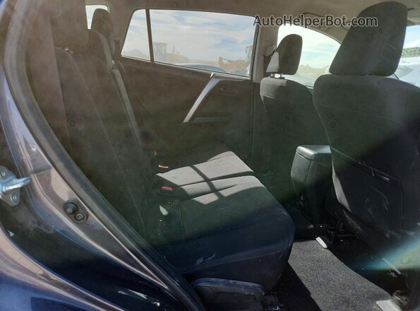 JTMBFREV4HJ707852 2017 TOYOTA RAV4 Gray Rear seats view