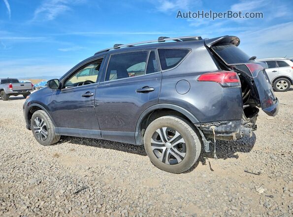 JTMBFREV4HJ707852 2017 TOYOTA RAV4 Gray Rear left