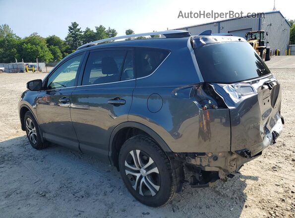 JTMBFREV5GD187478 2016 TOYOTA RAV4 Gray Trasero izquierdo