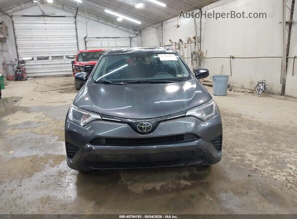 JTMBFREV5JJ732569 2018 TOYOTA RAV4 Gray Սարքավորումների վահանակի տեսք