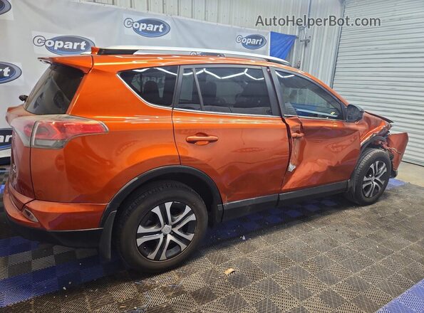JTMBFREV6GJ098391 2016 TOYOTA RAV4 Orange Задня права чверть