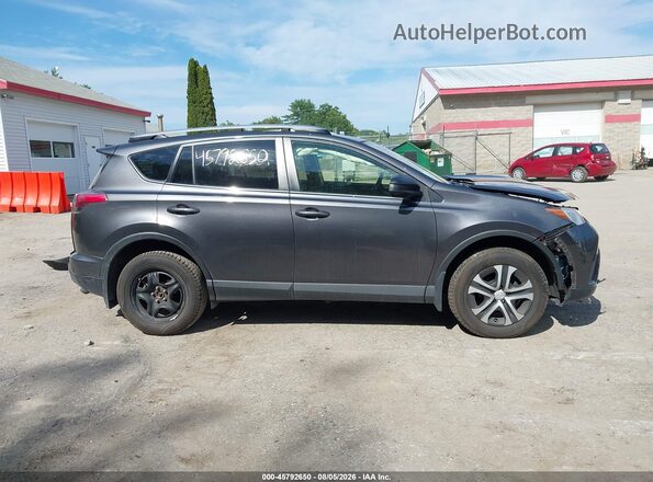 JTMBFREV6HJ115837 2017 TOYOTA RAV4 Серый Вид задней части салона