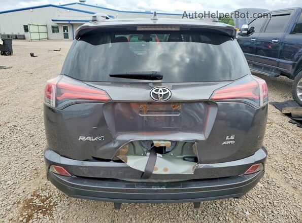JTMBFREV6JJ215698 2018 TOYOTA RAV4 Gray Rear view