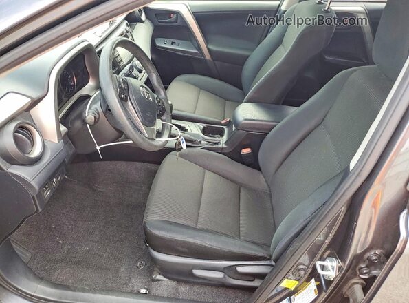 JTMBFREV6JJ215698 2018 TOYOTA RAV4 Gray Front interior view