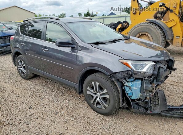 JTMBFREV6JJ215698 2018 TOYOTA RAV4 Gray Front right