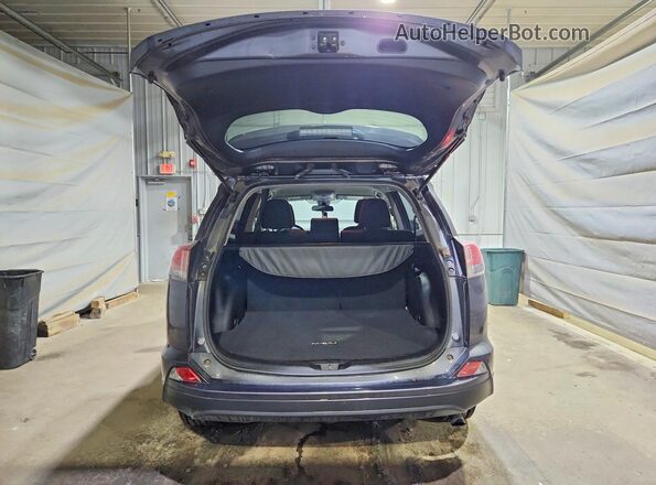 JTMBFREV6JJ244022 2018 TOYOTA RAV4 Серый Вид сзади