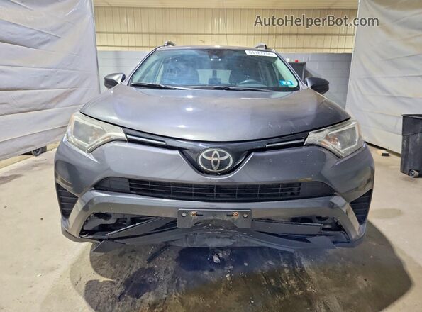 JTMBFREV6JJ244022 2018 TOYOTA RAV4 Серый Вид спереди