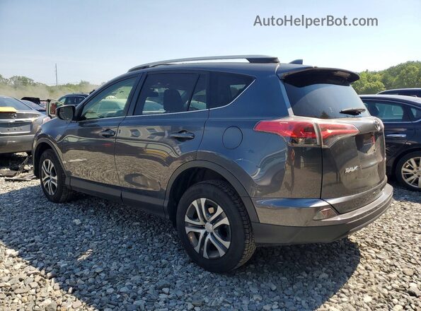 JTMBFREV7JJ213068 2018 TOYOTA RAV4 Gray Trasero izquierdo