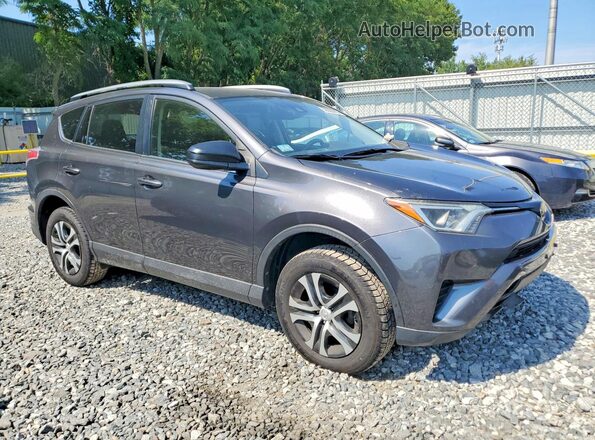JTMBFREV7JJ213068 2018 TOYOTA RAV4 Gray Delantero derecho