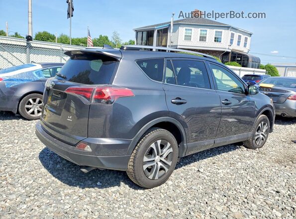 JTMBFREV7JJ213068 2018 TOYOTA RAV4 Gray Trasero derecho