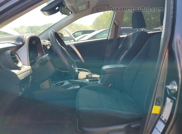 JTMBFREV7JJ213068 2018 TOYOTA RAV4 Gray Vista interior delantera
