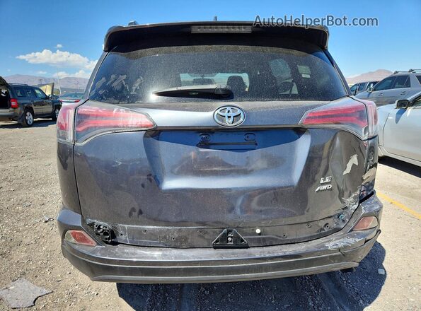JTMBFREV8GD192643 2016 TOYOTA RAV4 Charcoal Rear view