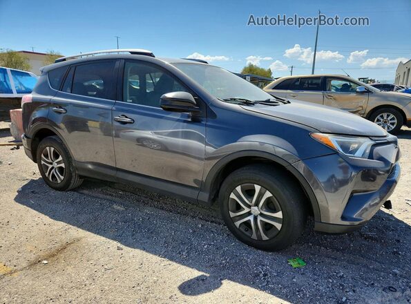 JTMBFREV8GD192643 2016 TOYOTA RAV4 Charcoal Front right