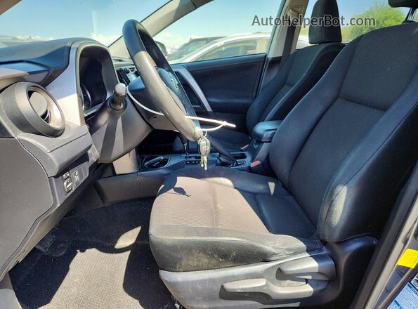 JTMBFREV8GD192643 2016 TOYOTA RAV4 Charcoal Front interior view