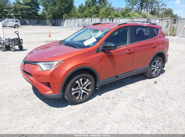 JTMBFREV8GJ099414 2016 TOYOTA RAV4 Оранжевый Передняя левая четверть