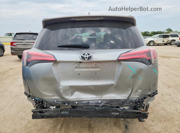 JTMBFREV8JJ193543 2018 TOYOTA RAV4 Gray Vista trasera