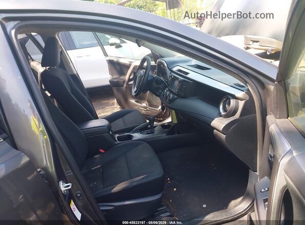 JTMBFREV8JJ738804 2018 TOYOTA RAV4 Серый Вид салона спереди