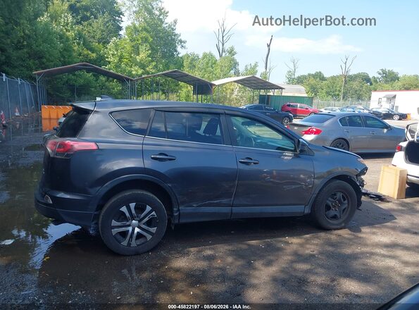 JTMBFREV8JJ738804 2018 TOYOTA RAV4 Серый Вид задней части салона