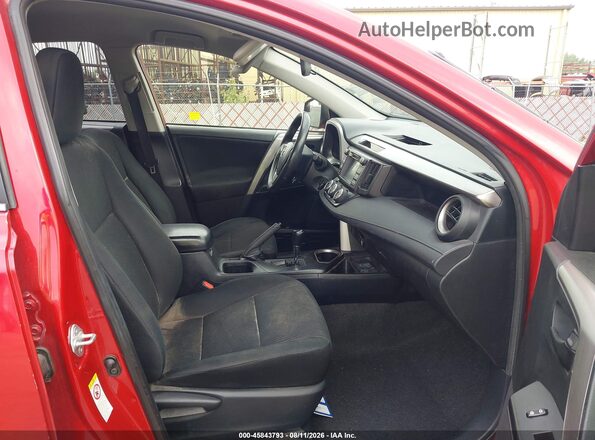 JTMBFREV9GJ073792 2016 TOYOTA RAV4 Red Widok wnętrza z przodu